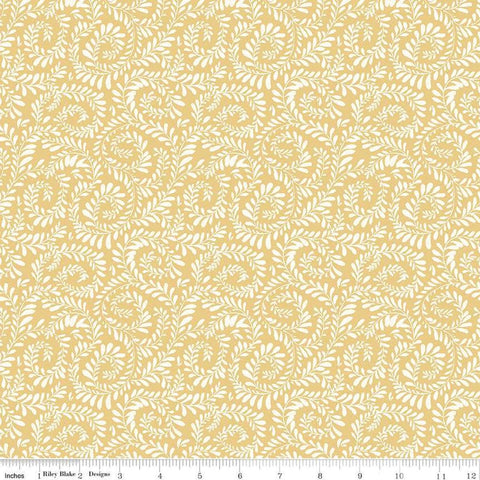 Image of Sunflower Whispers Ferns Yellow quilting cotton fabric by Lisa Audit for Riley Blake Designs. Features leaves on a yellow background. Cute Little Fabric Shop