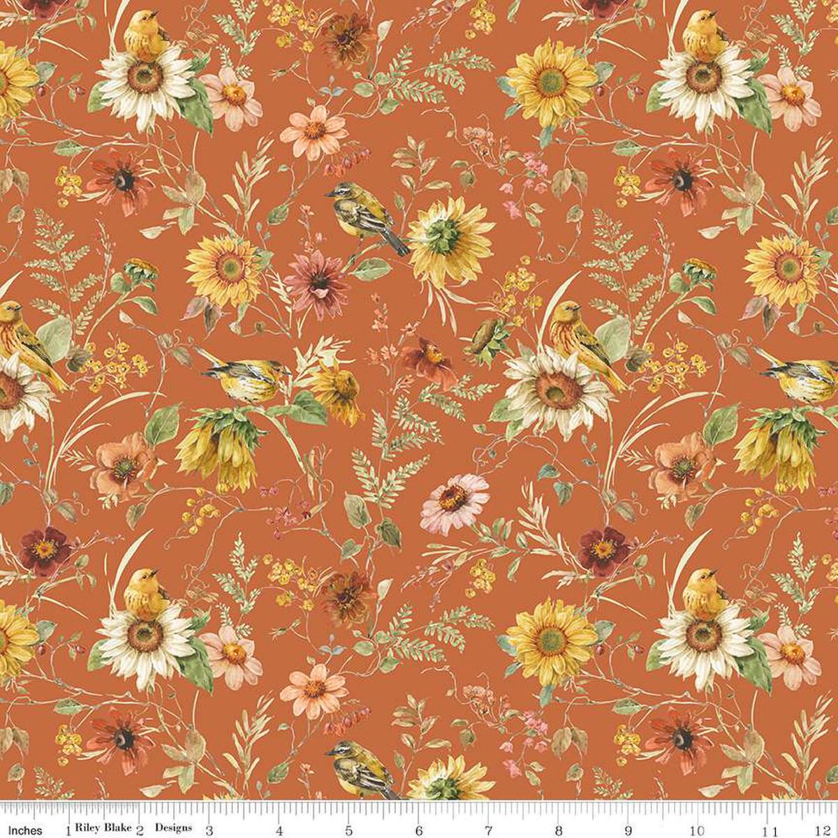 Image of Sunflower Whispers Prairie Pumpkin quilting cotton fabric by Lisa Audit for Riley Blake Designs. Features flowers on an orange background. Cute Little Fabric Shop