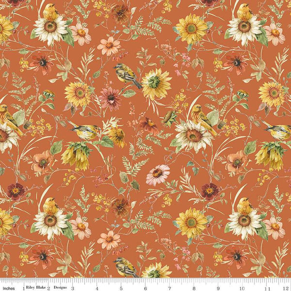 Image of Sunflower Whispers Prairie Pumpkin quilting cotton fabric by Lisa Audit for Riley Blake Designs. Features flowers on an orange background. Cute Little Fabric Shop