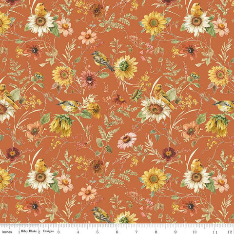 Image of Sunflower Whispers Prairie Pumpkin quilting cotton fabric by Lisa Audit for Riley Blake Designs. Features flowers on an orange background. Cute Little Fabric Shop