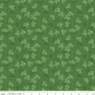 Image of Vera's Garden Leaves Green quilting cotton fabric by Vicki McCarty for Riley Blake Designs. Features leaves on a green background. Cute Little Fabric Shop