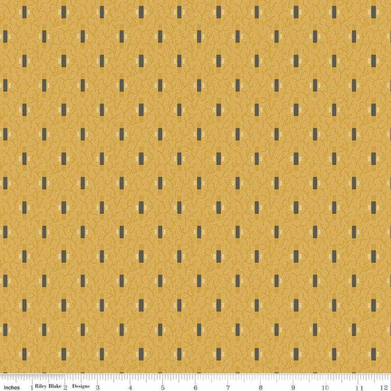 Image of Vera's Garden Dashes Gold quilting cotton fabric by Vicki McCarty for Riley Blake Designs. Features shapes on a yellow background. Cute Little Fabric Shop