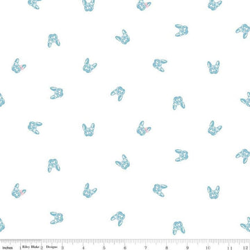 Image of Hush Hush 5 Frenchie Friends quilting cotton fabric by Assorted Designers for Riley Blake Designs. Features dog faces on an off-white background. Cute Little Fabric Shop.
