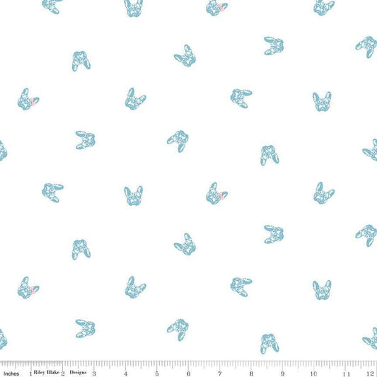 Image of Hush Hush 5 Frenchie Friends quilting cotton fabric by Assorted Designers for Riley Blake Designs. Features dog faces on an off-white background. Cute Little Fabric Shop.