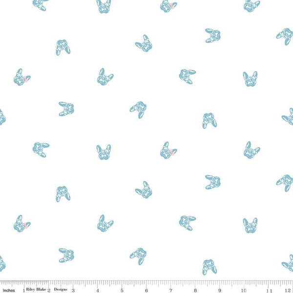Image of Hush Hush 5 Frenchie Friends quilting cotton fabric by Assorted Designers for Riley Blake Designs. Features dog faces on an off-white background. Cute Little Fabric Shop.