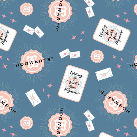 Image of Harry Potter Mystical Winter Wonder Hogwarts Letter Blue by Warner Brothers Official Licensing for Camelot Fabrics. Features letters on a blue background. Cute Little Fabric Shop
