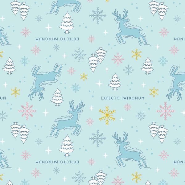 Image of Harry Potter Mystical Winter Wonder Icy Patronus Light Blue by Warner Brothers Official Licensing for Camelot Fabrics. Features patronuses on a blue background. Cute Little Fabric Shop