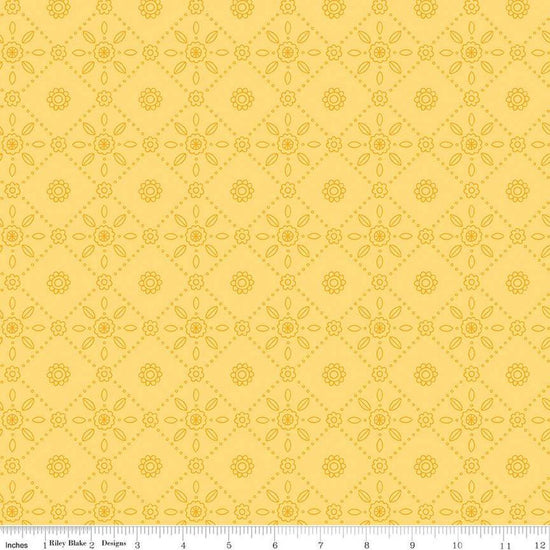 Image of Little Darlin' Folk Tile Yellow quilting cotton fabric by the RBD Designers for Riley Blake Designs. Features shapes on a yellow background. Cute Little Fabric Shop