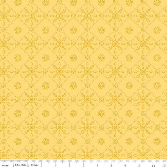Image of Little Darlin' Folk Tile Yellow quilting cotton fabric by the RBD Designers for Riley Blake Designs. Features shapes on a yellow background. Cute Little Fabric Shop