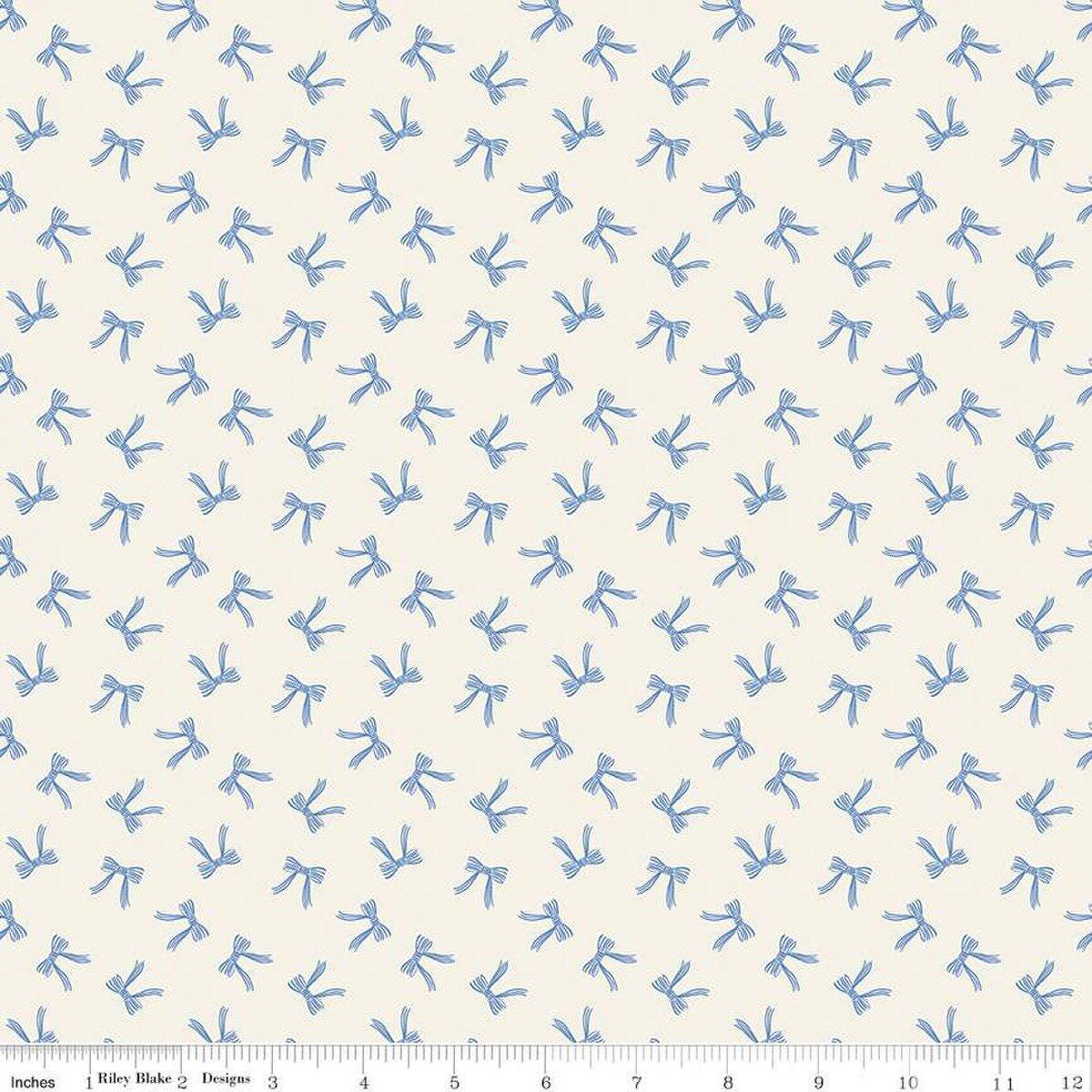 Image of Penelope Bows Cream quilting cotton fabric by My Mind's Eye for Riley Blake Designs. Features bows on a blue background. Cute Little Fabric Shop
