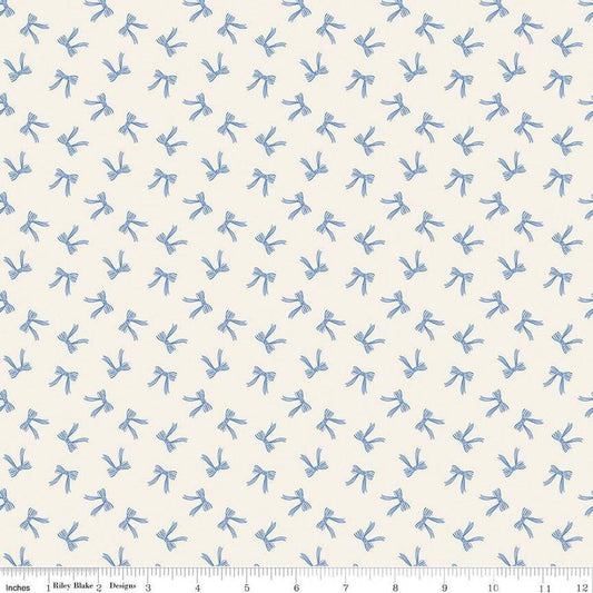Image of Penelope Bows Cream quilting cotton fabric by My Mind's Eye for Riley Blake Designs. Features bows on a blue background. Cute Little Fabric Shop