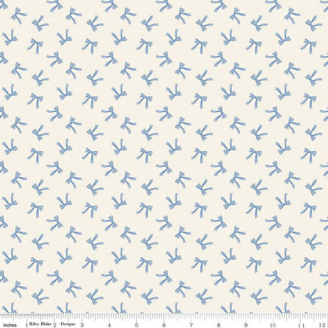 Image of Penelope Bows Cream quilting cotton fabric by My Mind&#39;s Eye for Riley Blake Designs. Features bows on a blue background. Cute Little Fabric Shop