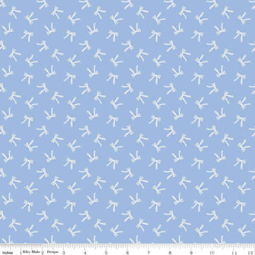 Image of Penelope Bows Sky quilting cotton fabric by My Mind's Eye for Riley Blake Designs. Features bows on a blue background. Cute Little Fabric Shop