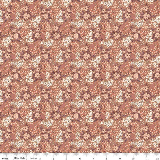 Image of the Evening on the Prairie Ditsy Floral Umber quilting cotton fabric by Modern Prairie for Riley Blake Designs. Features flowers on an orange background. Cute Little Fabric Shop
