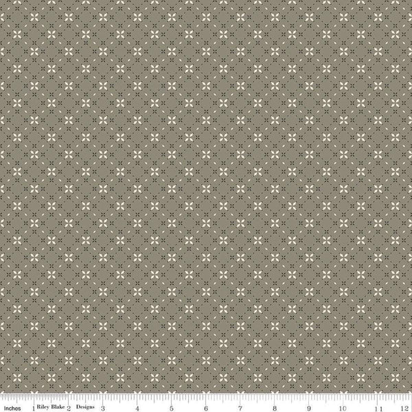 Image of the Evening on the Prairie Geo Floral Green quilting cotton fabric by Modern Prairie for Riley Blake Designs. Features geometric designs on a green background. Cute Little Fabric Shop