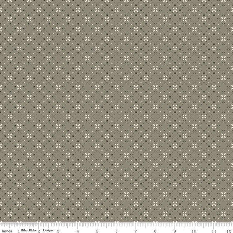 Image of the Evening on the Prairie Geo Floral Green quilting cotton fabric by Modern Prairie for Riley Blake Designs. Features geometric designs on a green background. Cute Little Fabric Shop