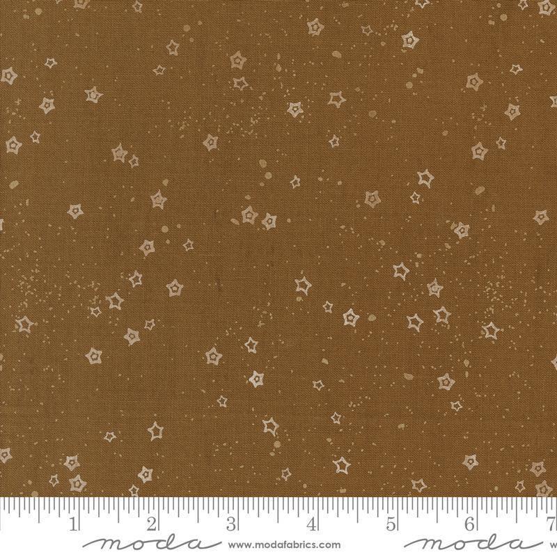 Images of Foraged Found Stardust Cocoa quilting cotton fabric by Fancy That Design House for Moda Fabrics. Features starts on a brown background. Cute Little Fabric Shop