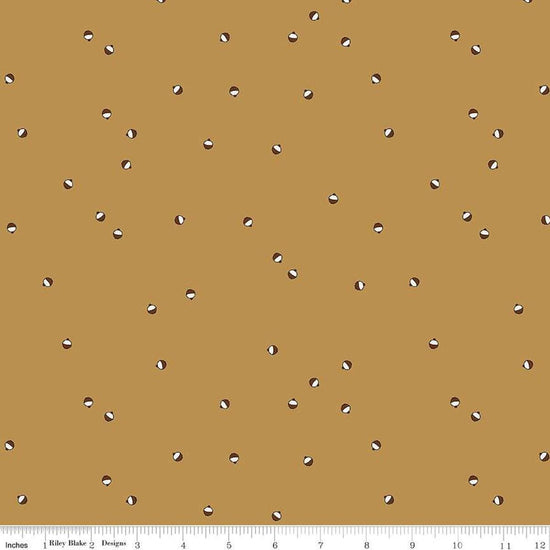 Image of Let's Wander Bobbers Golden quilting cotton fabric by Casey Cometti for Riley Blake Designs. Features bobbers on a gold background. Cute Little Fabric Shop