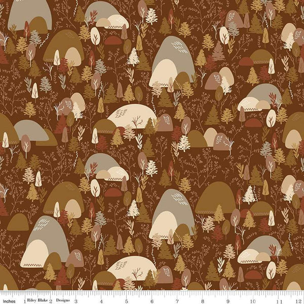 Image of Let&#39;s Wander Mountain Music Brown quilting cotton fabric by Casey Cometti for Riley Blake Designs. Features trees on a brown background. Cute Little Fabric Shop