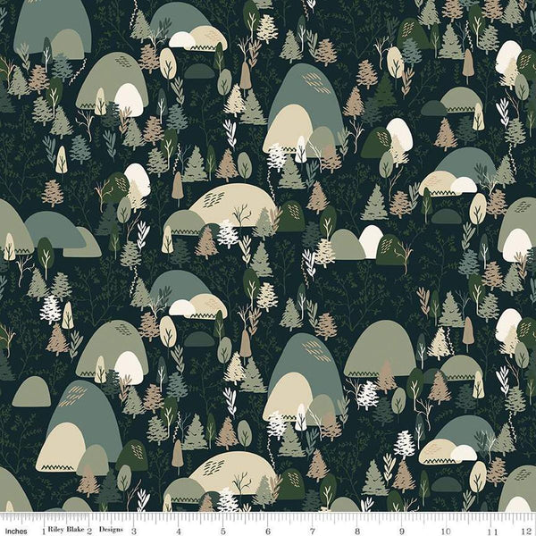 Image of Let&#39;s Wander Mountain Music Navy quilting cotton fabric by Casey Cometti for Riley Blake Designs. Features trees on a blue background. Cute Little Fabric Shop