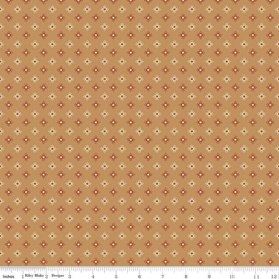 Image of John Wayne American West Sun Tan quilting cotton fabric by Riley Blake Official Product for Riley Blake Designs. Features suns on a tan background. Cute Little Fabric Shop