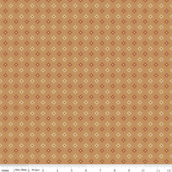 Image of John Wayne American West Sun Tan quilting cotton fabric by Riley Blake Official Product for Riley Blake Designs. Features suns on a tan background. Cute Little Fabric Shop