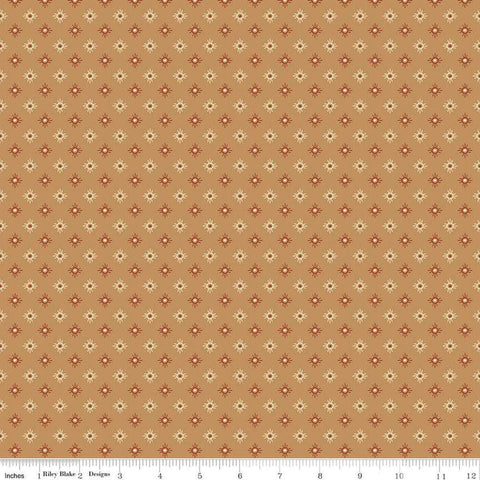 Image of John Wayne American West Sun Tan quilting cotton fabric by Riley Blake Official Product for Riley Blake Designs. Features suns on a tan background. Cute Little Fabric Shop