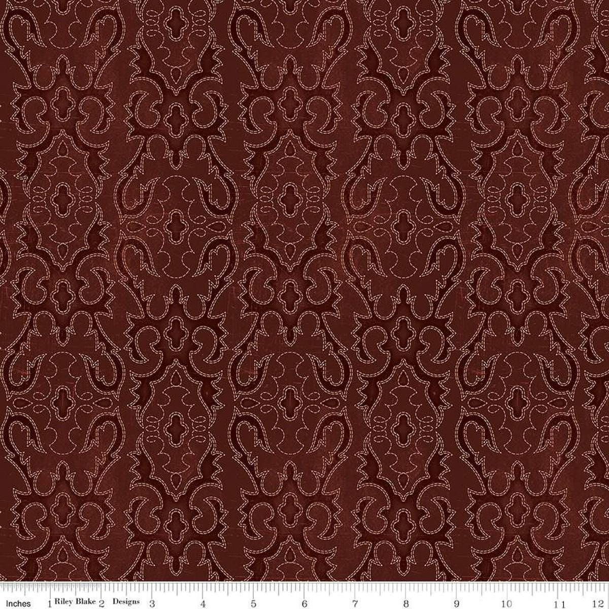 Image of John Wayne American West Boot Stitching Marsala quilting cotton fabric by Riley Blake Official Product for Riley Blake Designs. Features printed embroidery on a red background. Cute Little Fabric Shop
