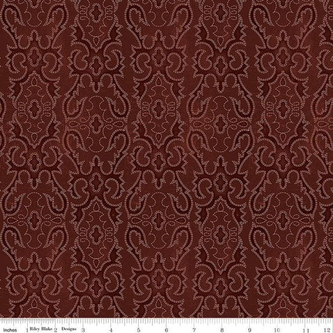 Image of John Wayne American West Boot Stitching Marsala quilting cotton fabric by Riley Blake Official Product for Riley Blake Designs. Features printed embroidery on a red background. Cute Little Fabric Shop
