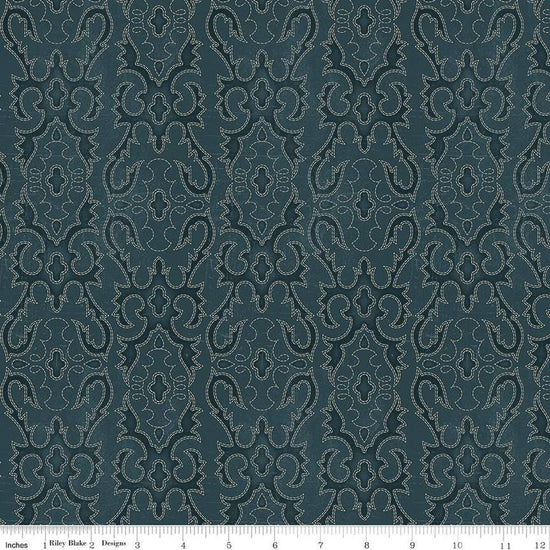 Image of John Wayne American West Boot Stitching Navy quilting cotton fabric by Riley Blake Official Product for Riley Blake Designs. Features printed embroidery on a blue background. Cute Little Fabric Shop