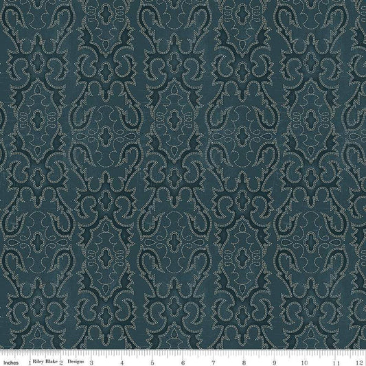 Image of John Wayne American West Boot Stitching Navy quilting cotton fabric by Riley Blake Official Product for Riley Blake Designs. Features printed embroidery on a blue background. Cute Little Fabric Shop