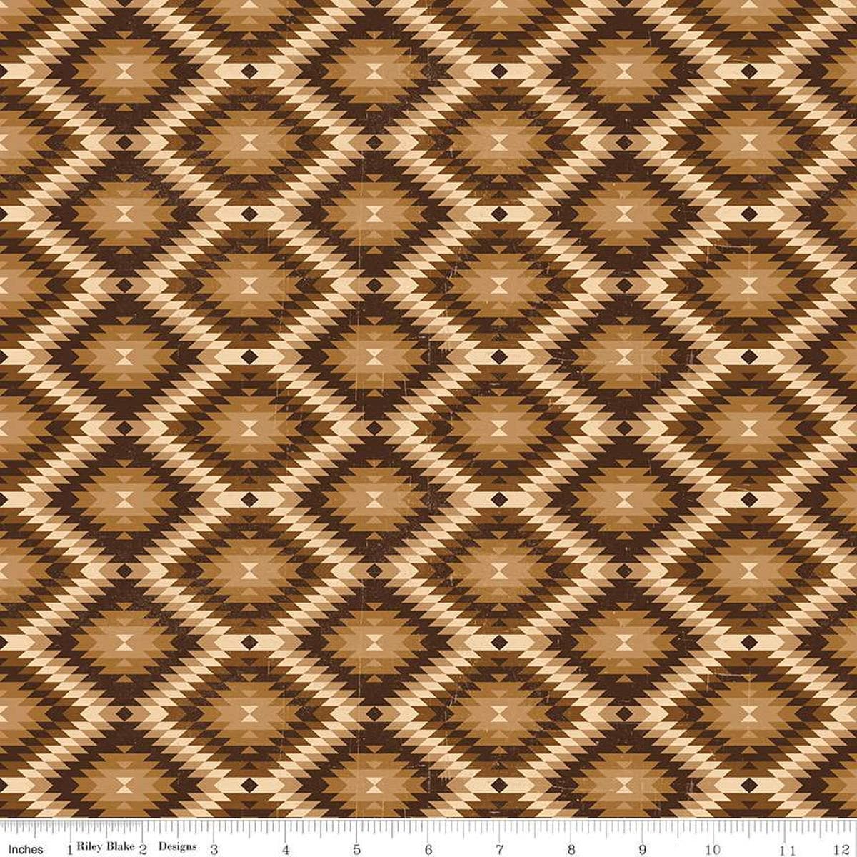 Image of John Wayne American West Southwest Brown quilting cotton fabric by Riley Blake Official Product for Riley Blake Designs. Features diamonds on a brown background. Cute Little Fabric Shop