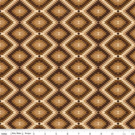 Image of John Wayne American West Southwest Brown quilting cotton fabric by Riley Blake Official Product for Riley Blake Designs. Features diamonds on a brown background. Cute Little Fabric Shop