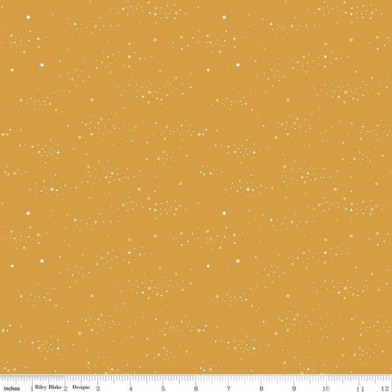 Image of Essence Starlight Golden quilting cotton fabric by Fran Gulick for Riley Blake Designs. Features stars on a yellow background. Cute Little Fabric Shop