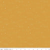 Image of Essence Starlight Golden quilting cotton fabric by Fran Gulick for Riley Blake Designs. Features stars on a yellow background. Cute Little Fabric Shop