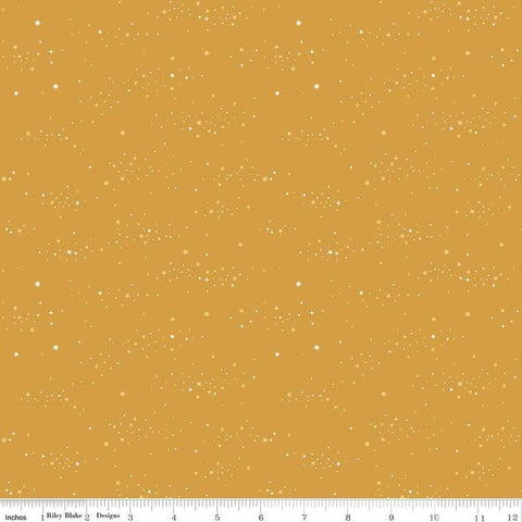 Image of Essence Starlight Golden quilting cotton fabric by Fran Gulick for Riley Blake Designs. Features stars on a yellow background. Cute Little Fabric Shop