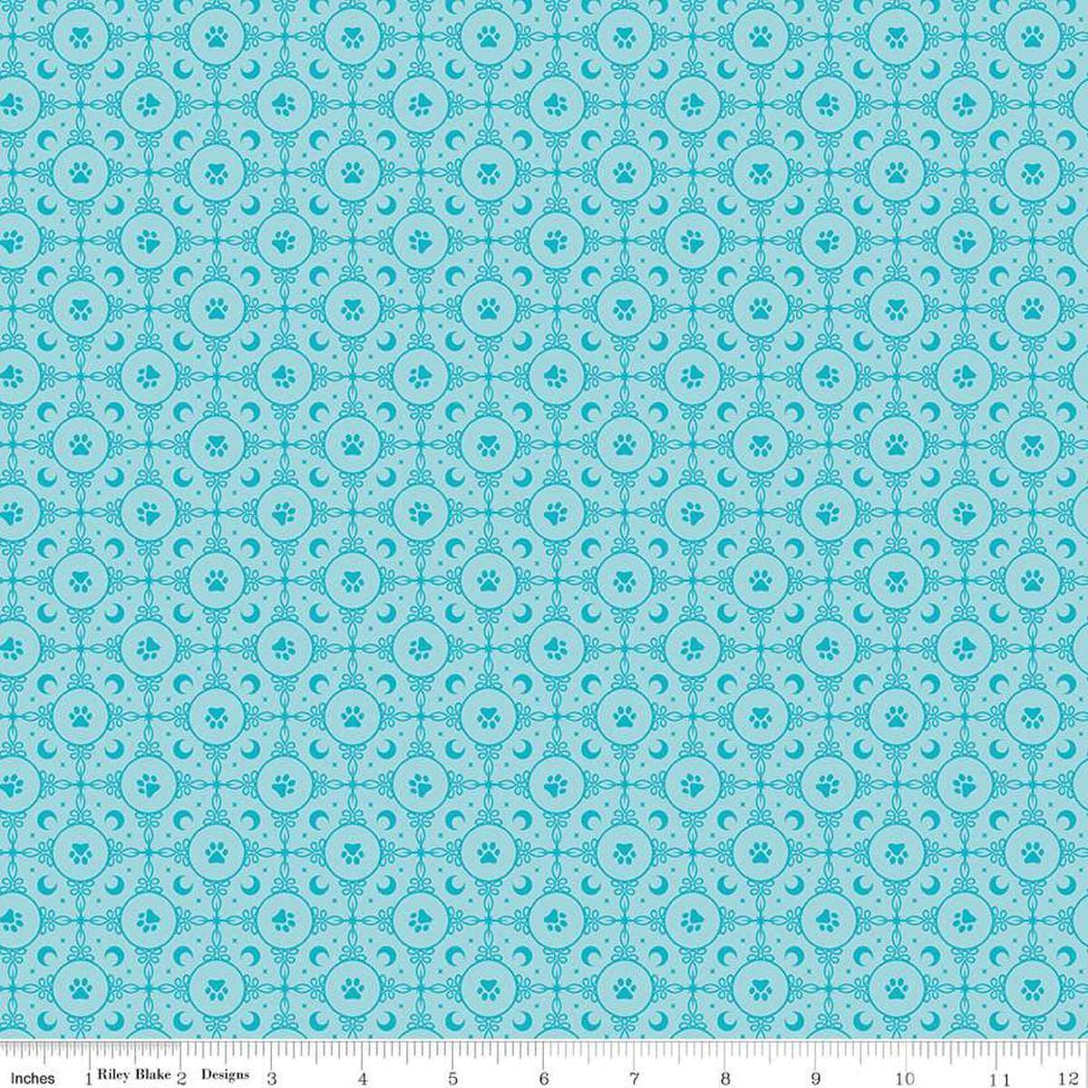 Image of Celtic Cats Circle Paws Aqua quilting cotton fabric by Brigid Ashwood for Riley Blake Designs. Features pawprints on a blue background. Cute Little Fabric Shop