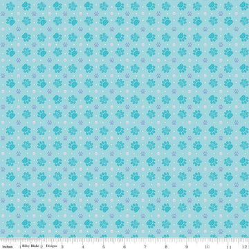Image of Celtic Cats Paws Aqua quilting cotton fabric by Brigid Ashwood for Riley Blake Designs. Features pawprints on a blue background. Cute Little Fabric Shop