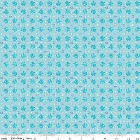 Image of Celtic Cats Paws Aqua quilting cotton fabric by Brigid Ashwood for Riley Blake Designs. Features pawprints on a blue background. Cute Little Fabric Shop