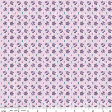 Image of Celtic Cats Paws Lilac quilting cotton fabric by Brigid Ashwood for Riley Blake Designs. Features pawprints on a purple background. Cute Little Fabric Shop