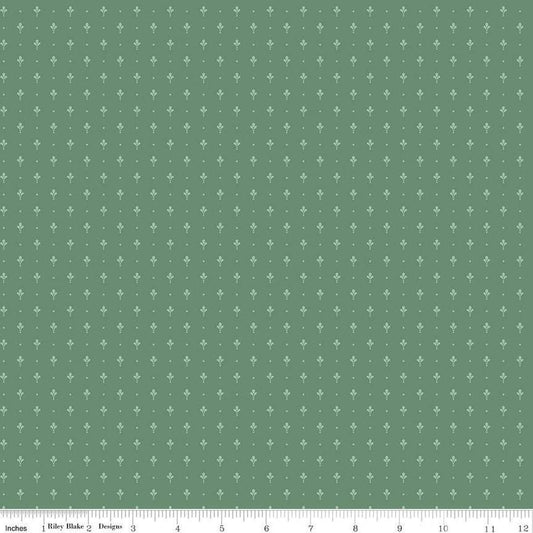 Image of Mary Catherine Petals Lodge Pole quilting cotton fabric by Amy Smart for Riley Blake Designs. Features flowers on a green background. Cute Little Fabric Shop