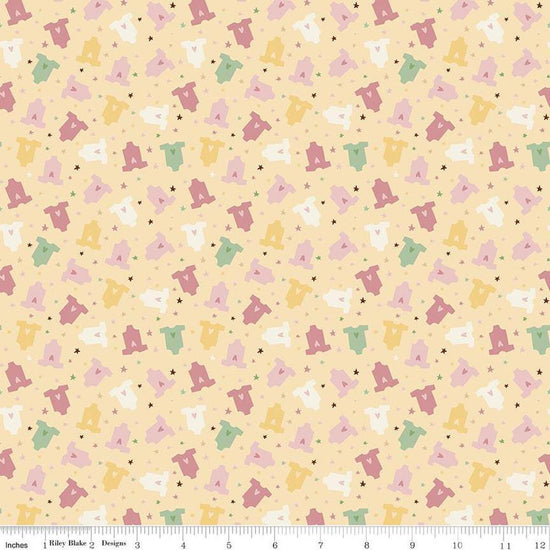 Image of Baby Girl Onesies Yellow quilting cotton fabric by Lori Whitlock for Riley Blake Designs. Features onesies on a yellow background. Cute Little Fabric Shop