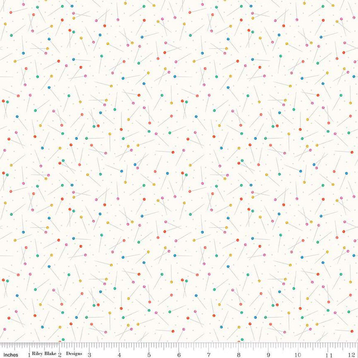 Image of Hand Made Pins Cloud quilting cotton fabric by Amber Kemp-Gerstel for Riley Blake Designs. Features pins on an off-white background. Cute Little Fabric Shop