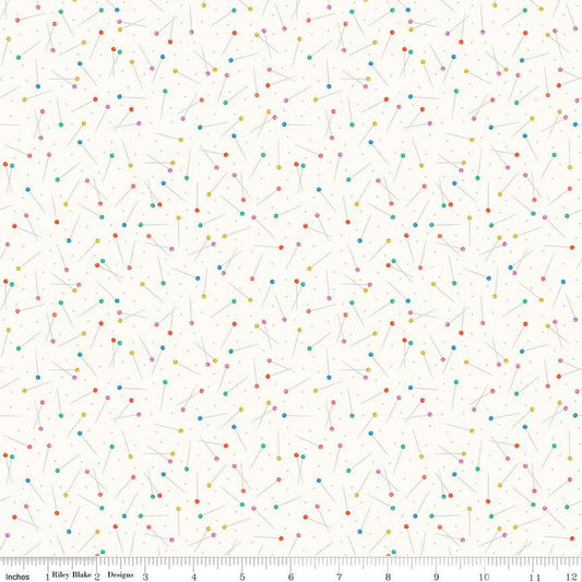 Image of Hand Made Pins Cloud quilting cotton fabric by Amber Kemp-Gerstel for Riley Blake Designs. Features pins on an off-white background. Cute Little Fabric Shop