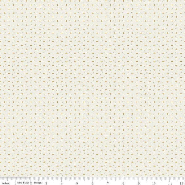 Image of Ivy Reese Ditsy Cloud quilting cotton fabric by Deena Rutter for Riley Blake Designs. Features small shapes on an off-white background. Cute Little Fabric Shop