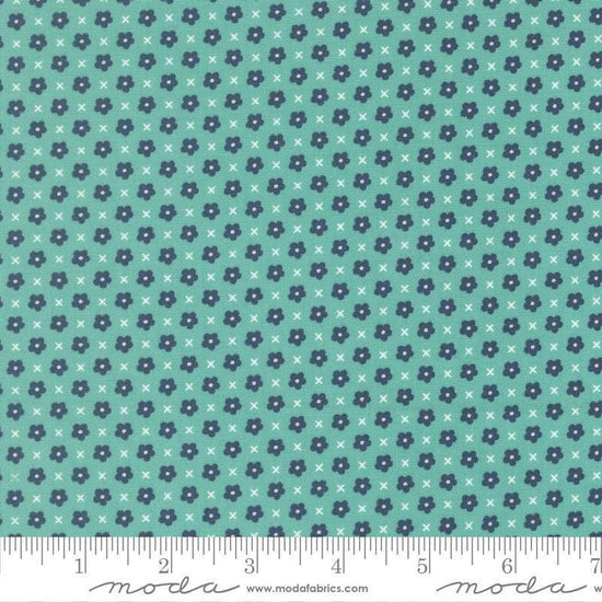 Image of Delightfully Yours Blooms Poolside quilting cotton fabric by Sherri & Chelsi for Moda Fabrics. Features flowers on a blue background. Cute Little Fabric Shop