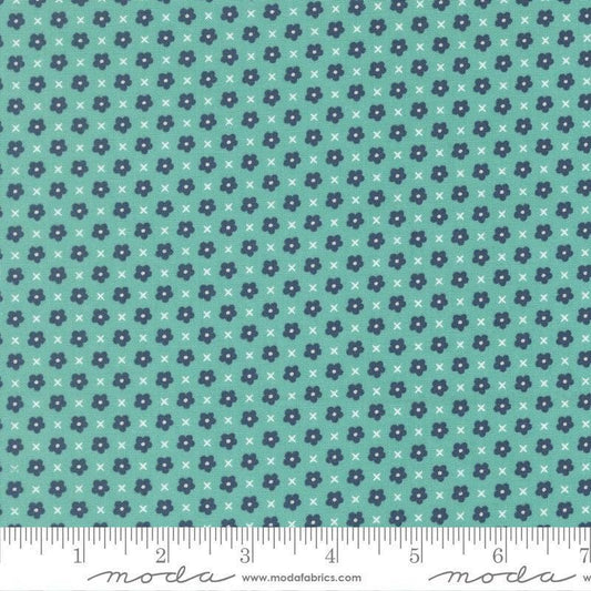 Image of Delightfully Yours Blooms Poolside quilting cotton fabric by Sherri & Chelsi for Moda Fabrics. Features flowers on a blue background. Cute Little Fabric Shop