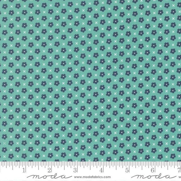 Image of Delightfully Yours Blooms Poolside quilting cotton fabric by Sherri & Chelsi for Moda Fabrics. Features flowers on a blue background. Cute Little Fabric Shop