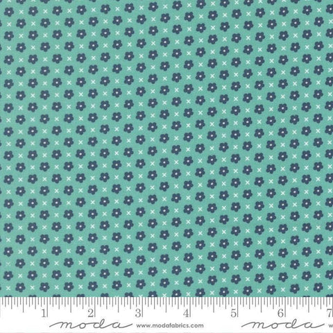 Image of Delightfully Yours Blooms Poolside quilting cotton fabric by Sherri & Chelsi for Moda Fabrics. Features flowers on a blue background. Cute Little Fabric Shop