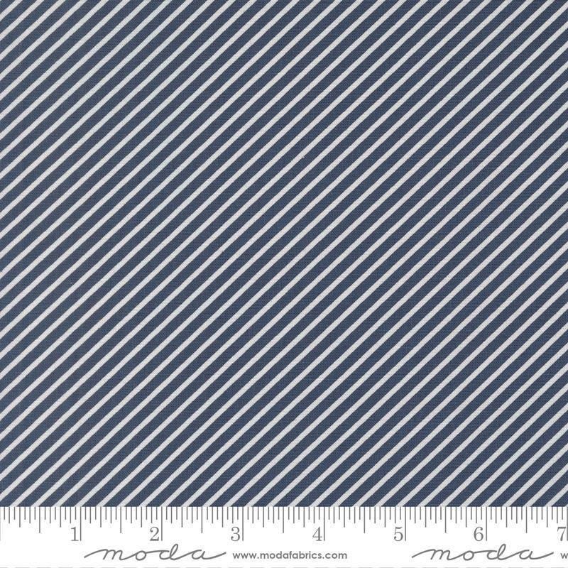 Image of Delightfully Yours Stripes Navy quilting cotton fabric by Sherri & Chelsi for Moda Fabrics. Features stripes on a blue background. Cute Little Fabric Shop